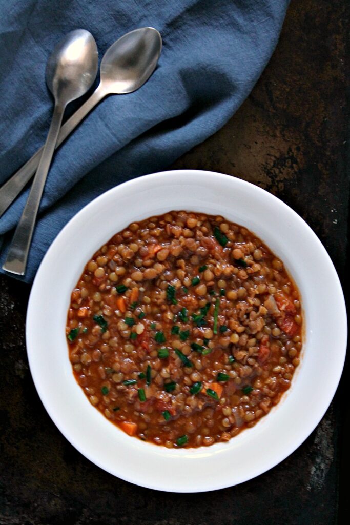 Vegetable and Lentil Soup in a white bowl.